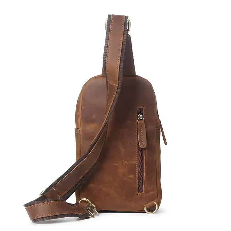 Erling leather sling bag in premium full-grain brown leather with an adjustable crossbody strap. — view 3