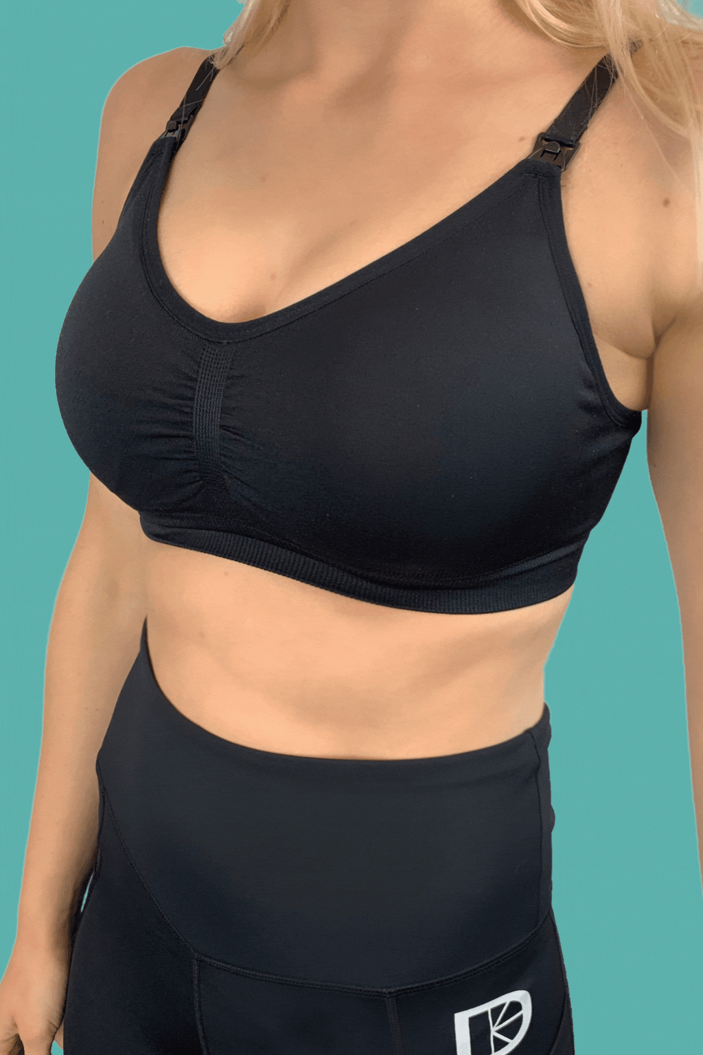 Black seamfree maternity and nursing bra with ribbed underband and drop-down nursing clips — view 2