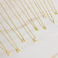 18k gold plated initial necklace with cubic zirconia stones on a delicate chain
