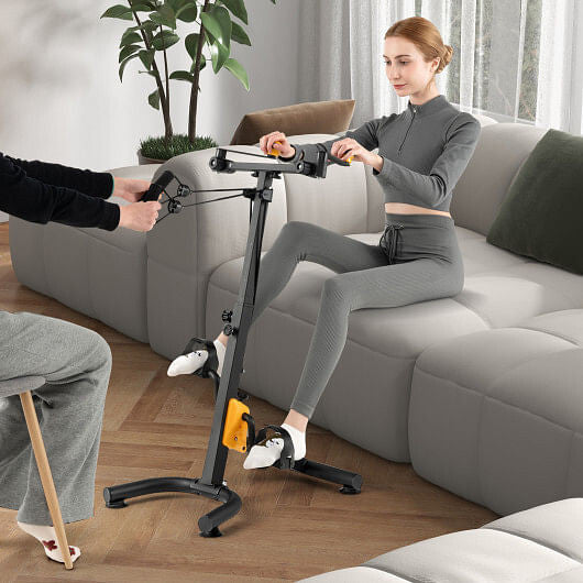 Yellow pedal exerciser for seniors with adjustable handgrips, pedal straps, and non-slip foot base — view 2