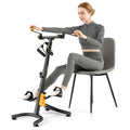 Yellow pedal exerciser for seniors with adjustable handgrips, pedal straps, and non-slip foot base