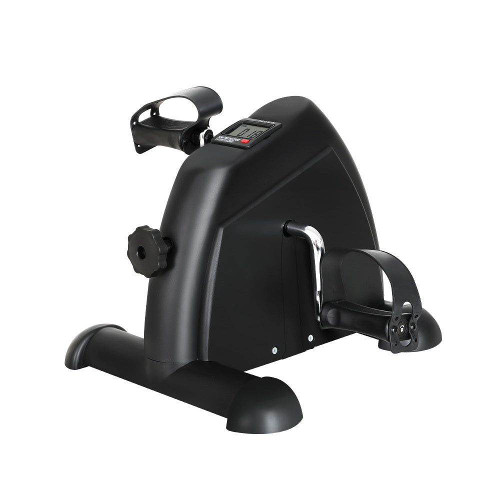 Black mini exercise bike under desk pedal exerciser with adjustable resistance knob and digital LED monitor