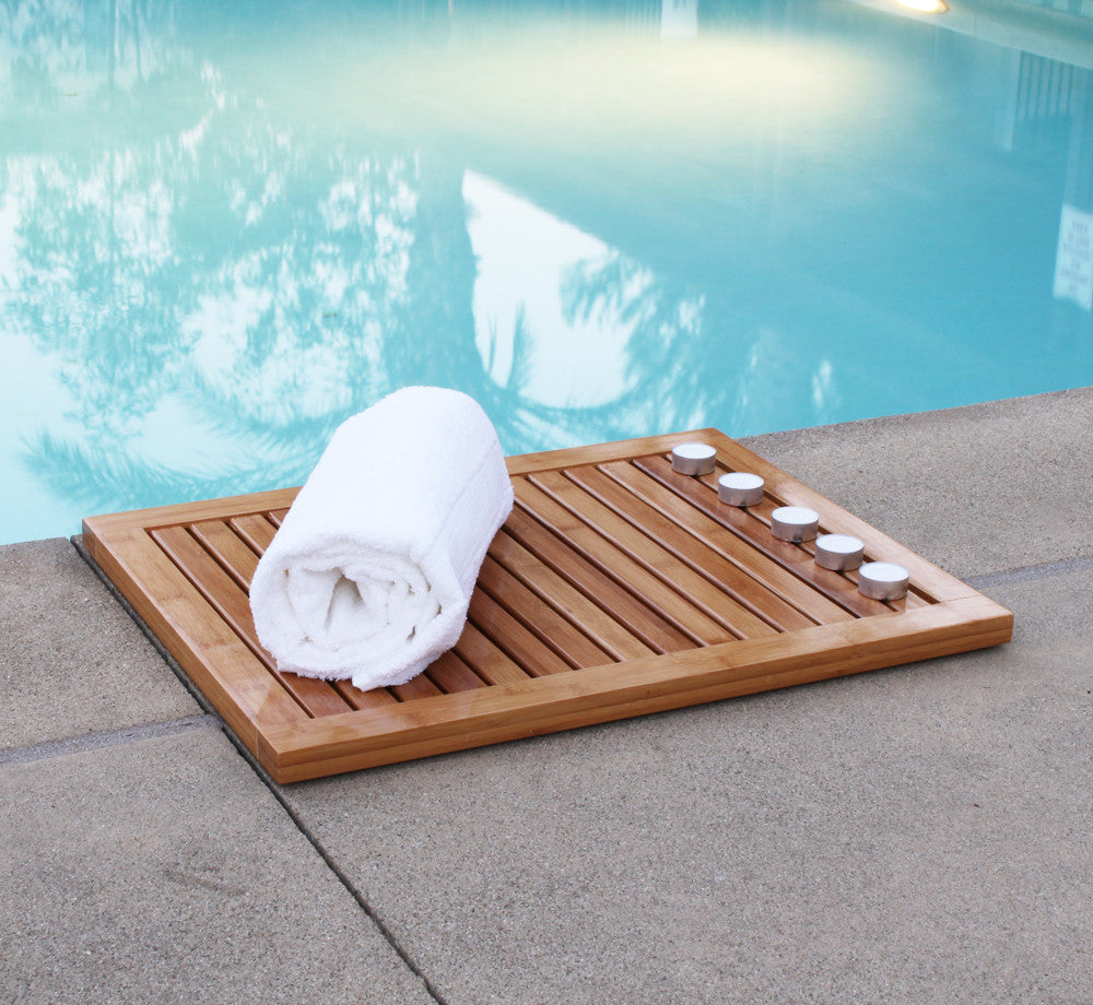 Natural bamboo shower mat featuring a slatted rectangular design with elevated anti-slip rubber feet underneath. — view 6