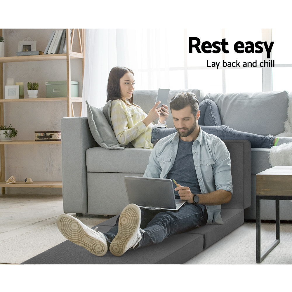 Dark grey folding foam single mattress convertible into a small sofa bed with textured fabric — view 4