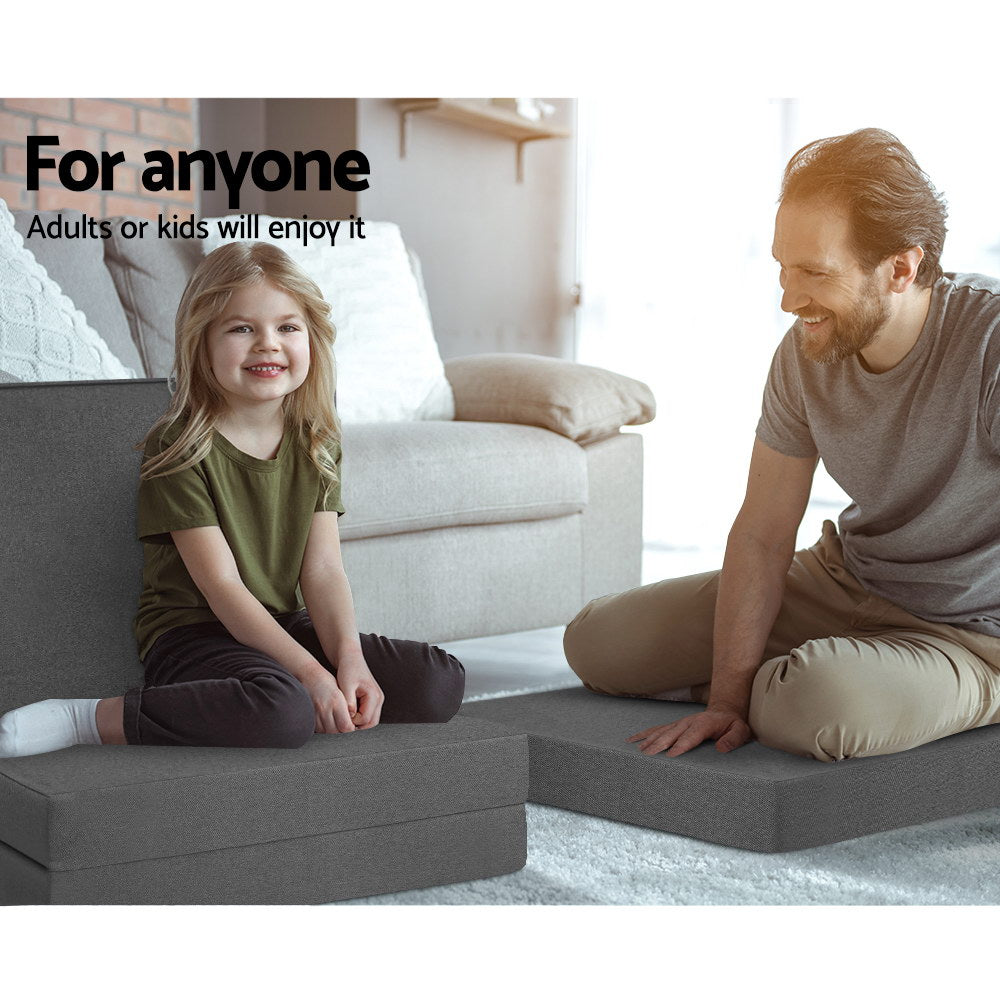 Dark grey folding foam single mattress convertible into a small sofa bed with textured fabric — view 5