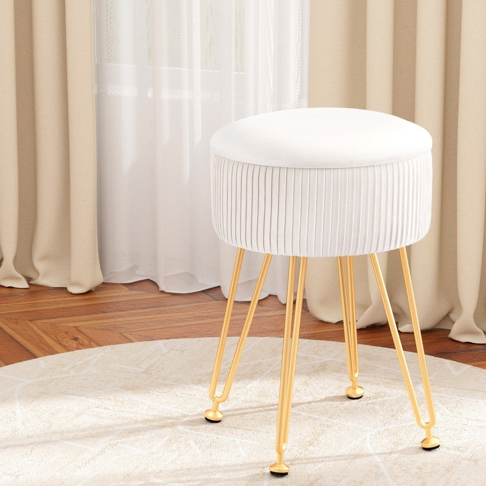 Round white velvet storage ottoman with reversible table lid and adjustable gold metal legs