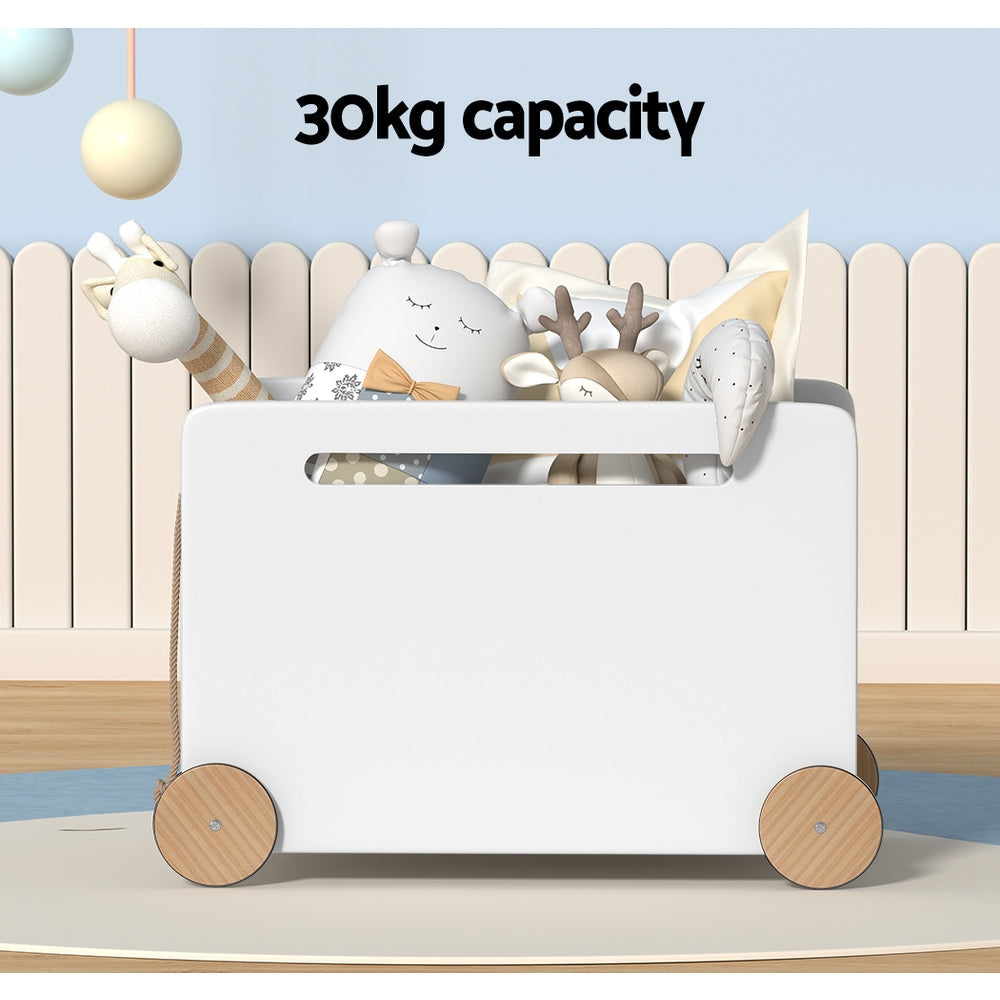 White wooden kids toy box storage chest with four wheels and pull rope — view 4