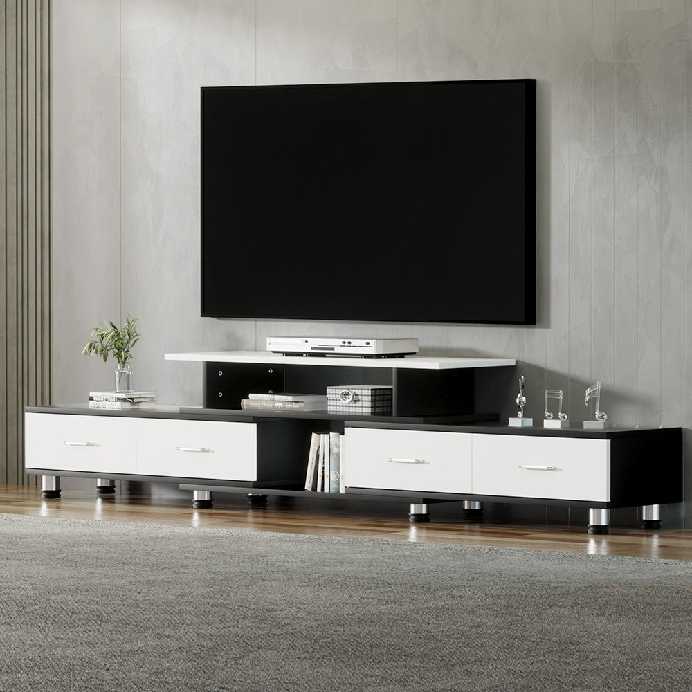 Black and white extendable Artiss TV cabinet with four drawers, open shelves, and chrome metal legs