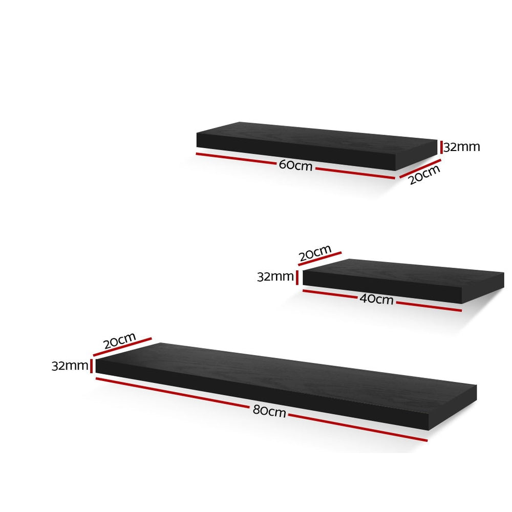 Three modern minimalist black floating wall shelves arranged on a wall for stylish home decor — view 2