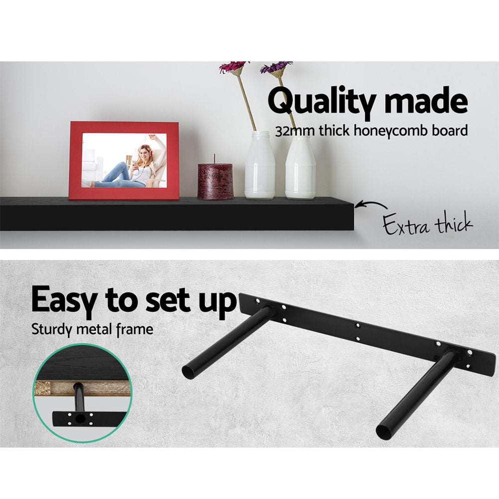 Three modern minimalist black floating wall shelves arranged on a wall for stylish home decor — view 4
