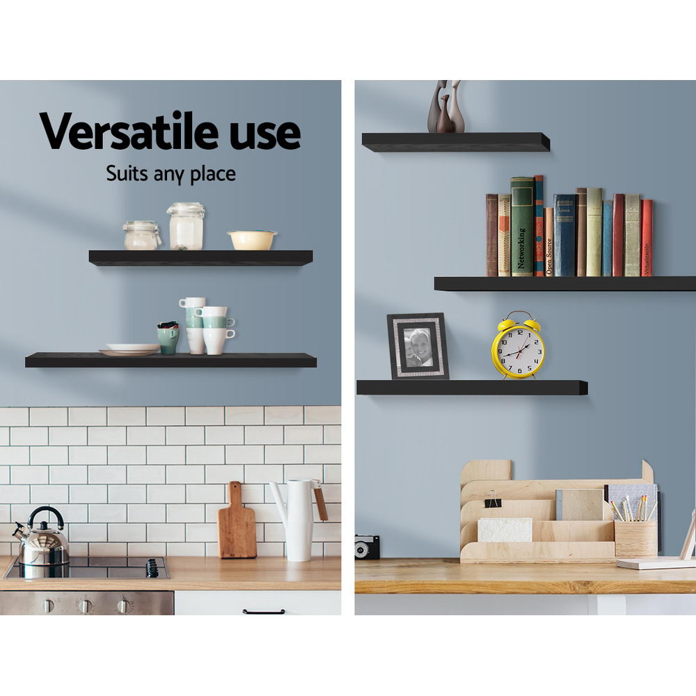 Three modern minimalist black floating wall shelves arranged on a wall for stylish home decor — view 5
