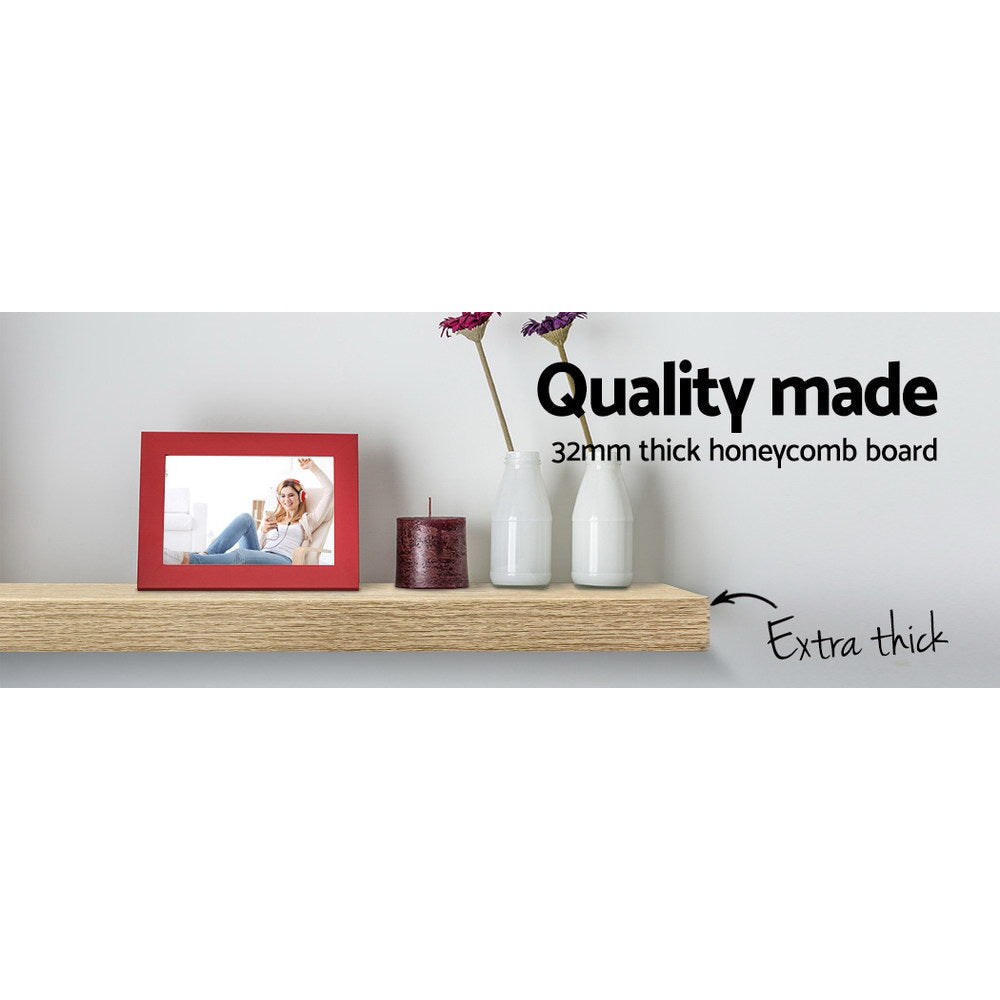 Oak floating wall shelves set of three mounted in a modern living room display — view 4