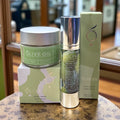 Premium botanical face care bundle featuring a citrus facial scrub and juniper orange hydrating serum