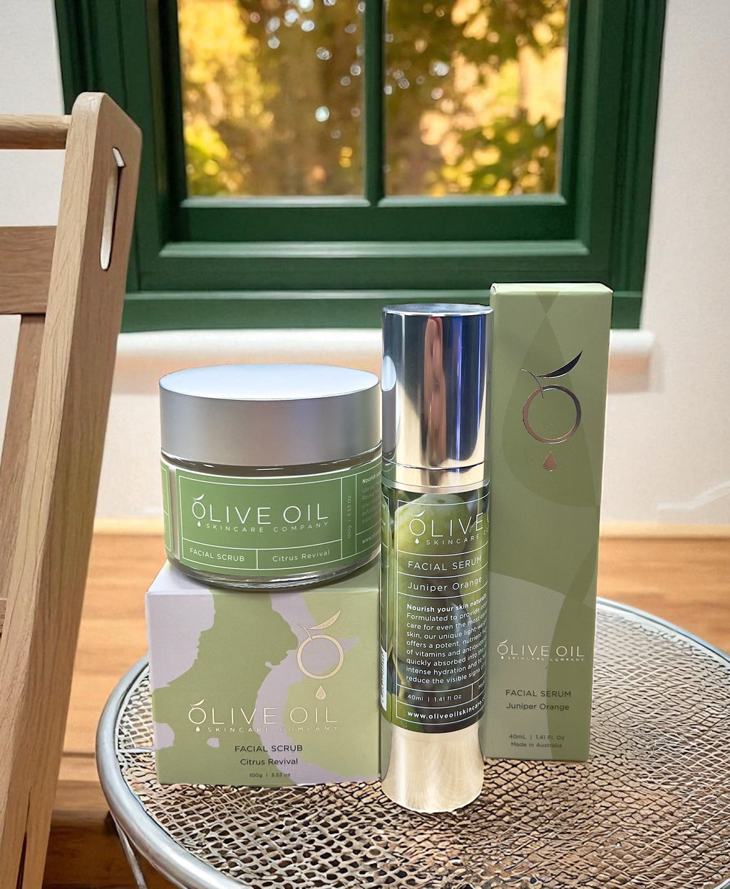 Premium botanical face care bundle featuring a citrus facial scrub and juniper orange hydrating serum — view 2