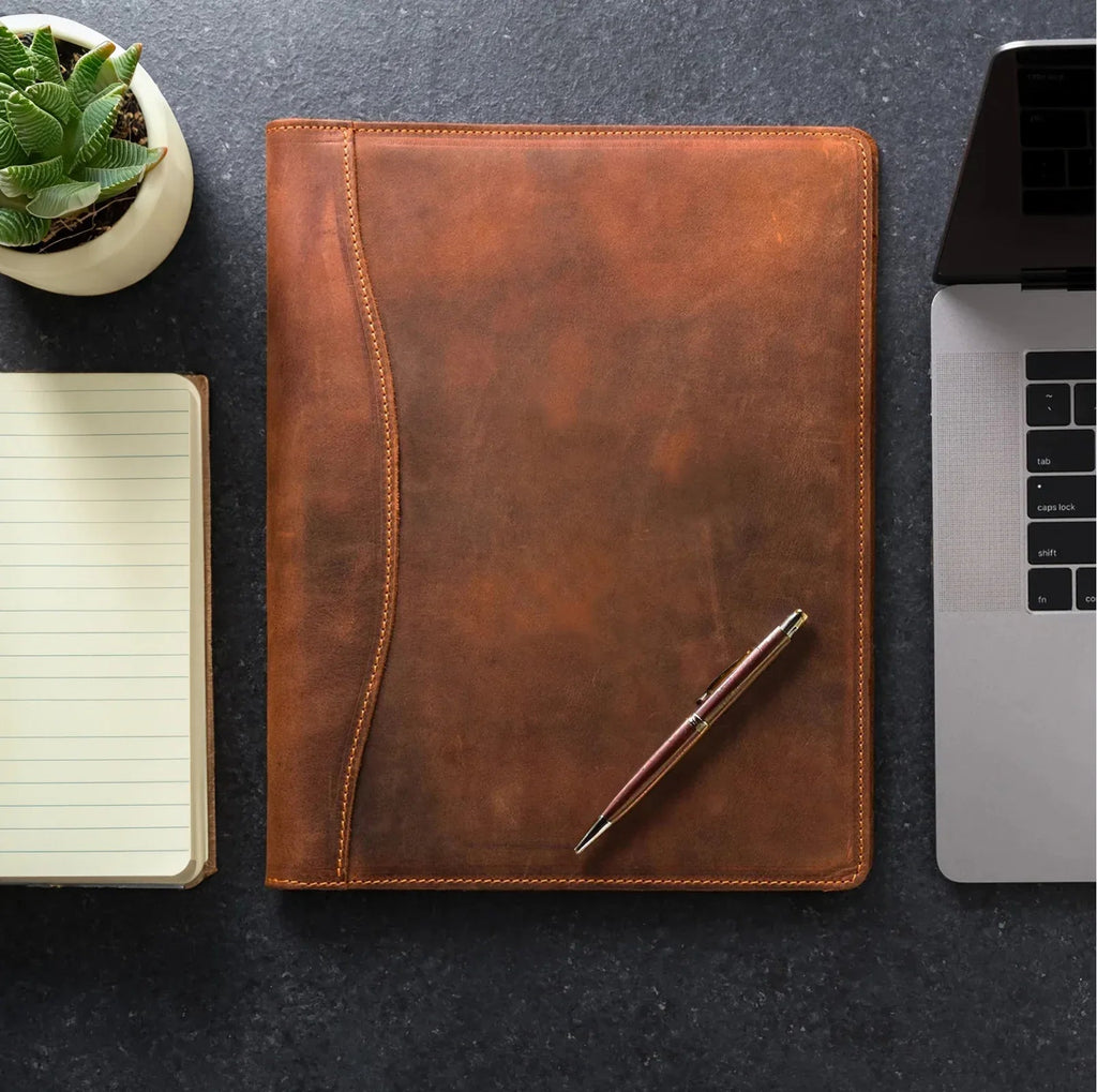 Handmade leather padfolio in vintage brown, open to show A4 document pockets and pen loop. — view 2