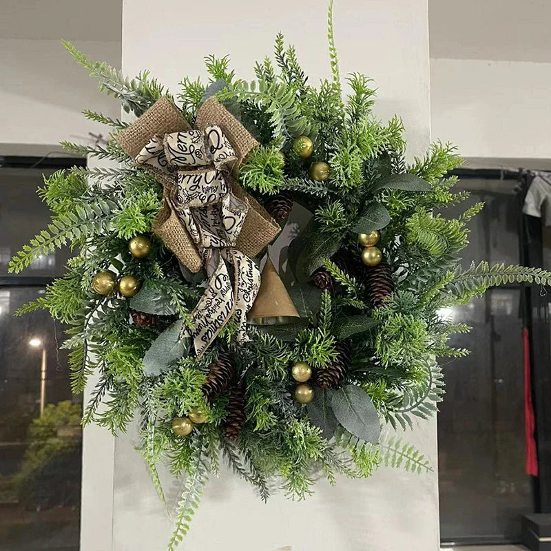 Farmhouse Christmas wreath with green pine foliage, red berries, and oversized golden bells — view 3