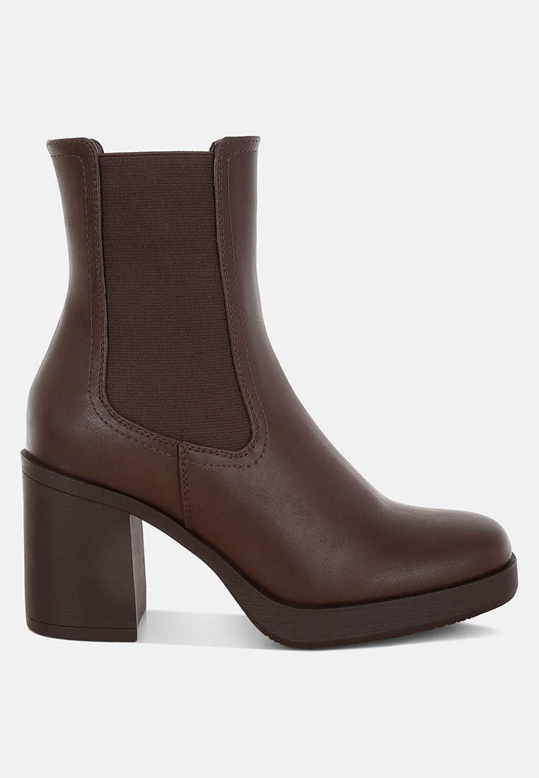 Womens faux leather Chelsea boots with elastic gussets and a three inch platform block heel.