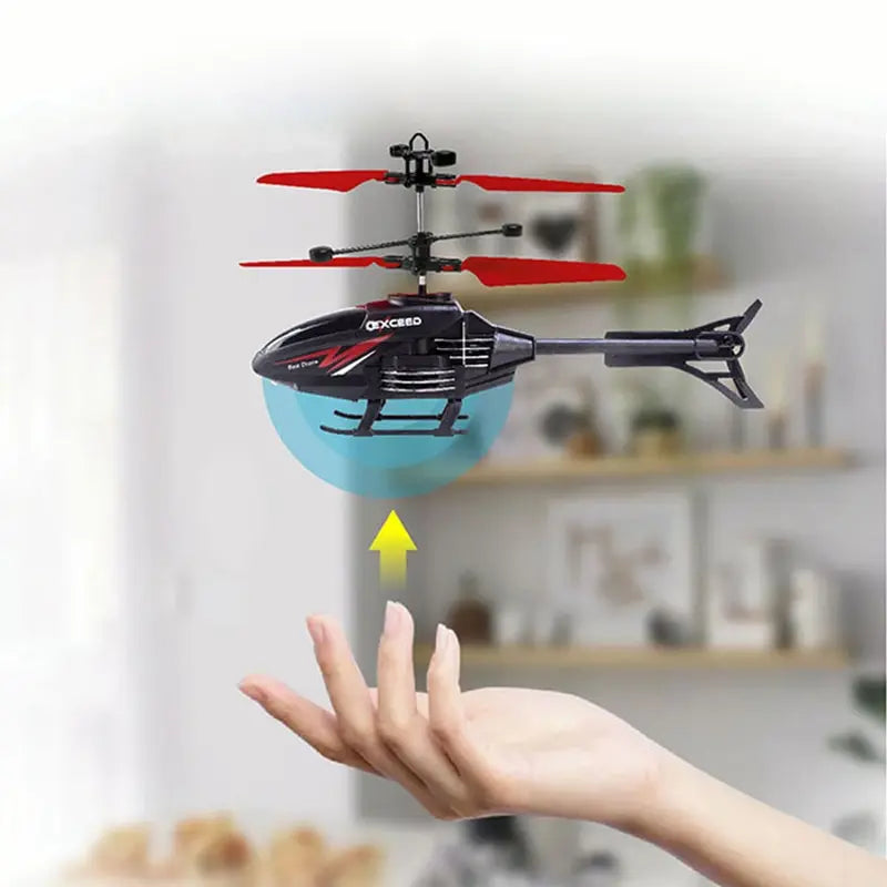 Floating RC helicopter with remote control, featuring sleek plastic body and levitation induction propellers — view 3