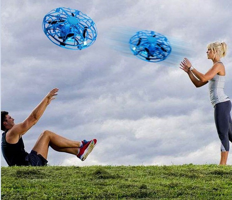 Compact hand-controlled flying saucer mini drone with flexible ABS guardrail and intelligent infrared sensors. — view 3