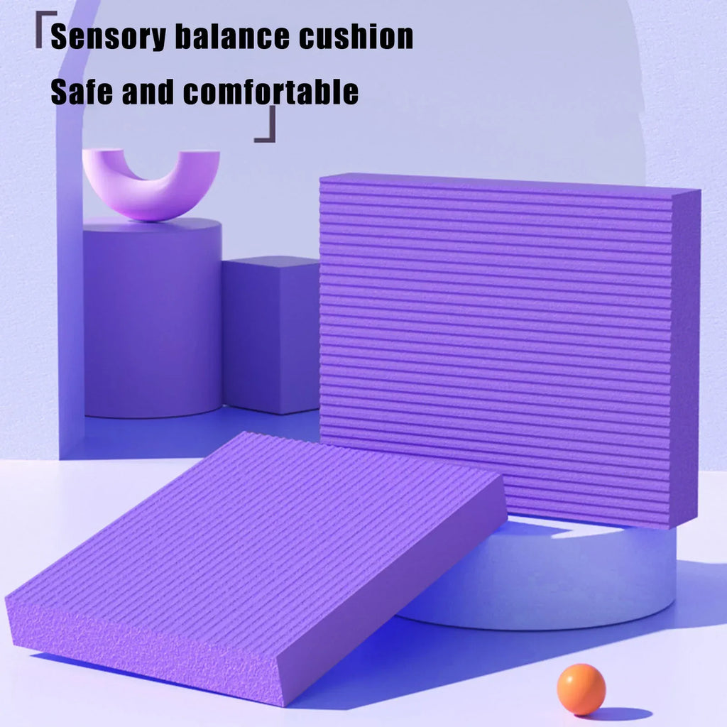 Purple NBR foam exercise balance pad for yoga and physical therapy on a flat surface — view 2