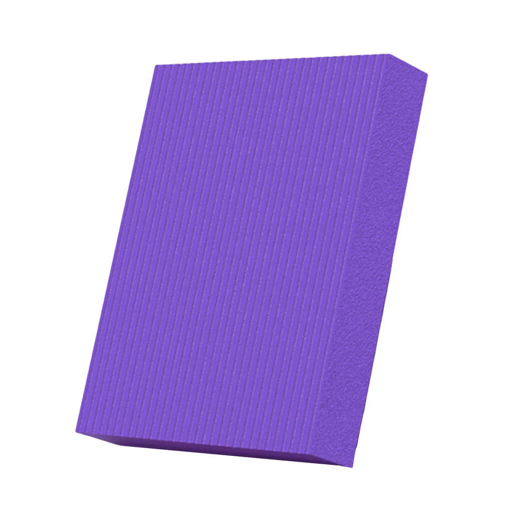 Purple NBR foam exercise balance pad for yoga and physical therapy on a flat surface