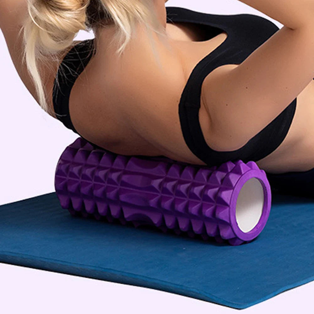 Black and blue EVA foam massage roller for deep tissue muscle recovery and physical therapy