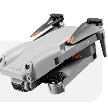 Black folding 4K dual camera drone with remote control and propellers extended for flight — view 5