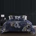 Dark blue floral reversible 5-piece cotton comforter set with matching shams and decorative pillows