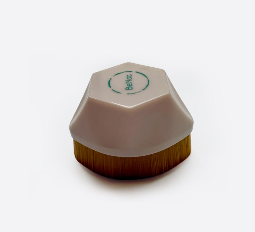 White synthetic foundation makeup brush with a solid ergonomic handle and densely packed soft bristles. — view 2