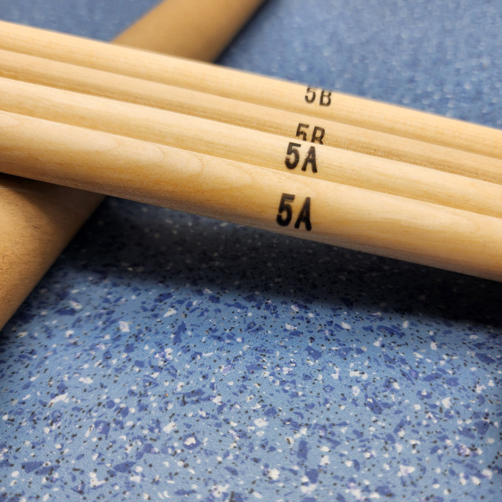 12 pairs of natural maple wood drumsticks with orange accents for acoustic drum sets — view 5