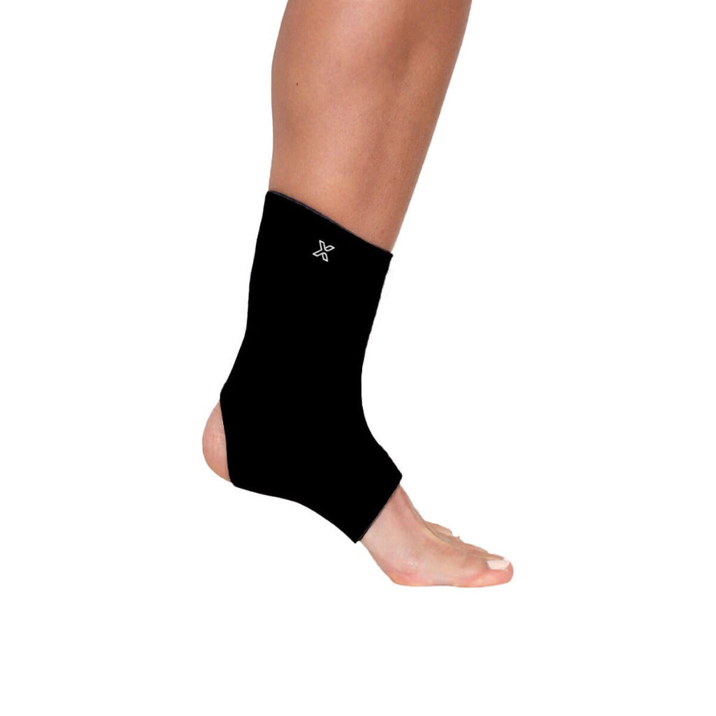 Full ankle compression sleeve in black synthetic rubber for joint support and injury recovery