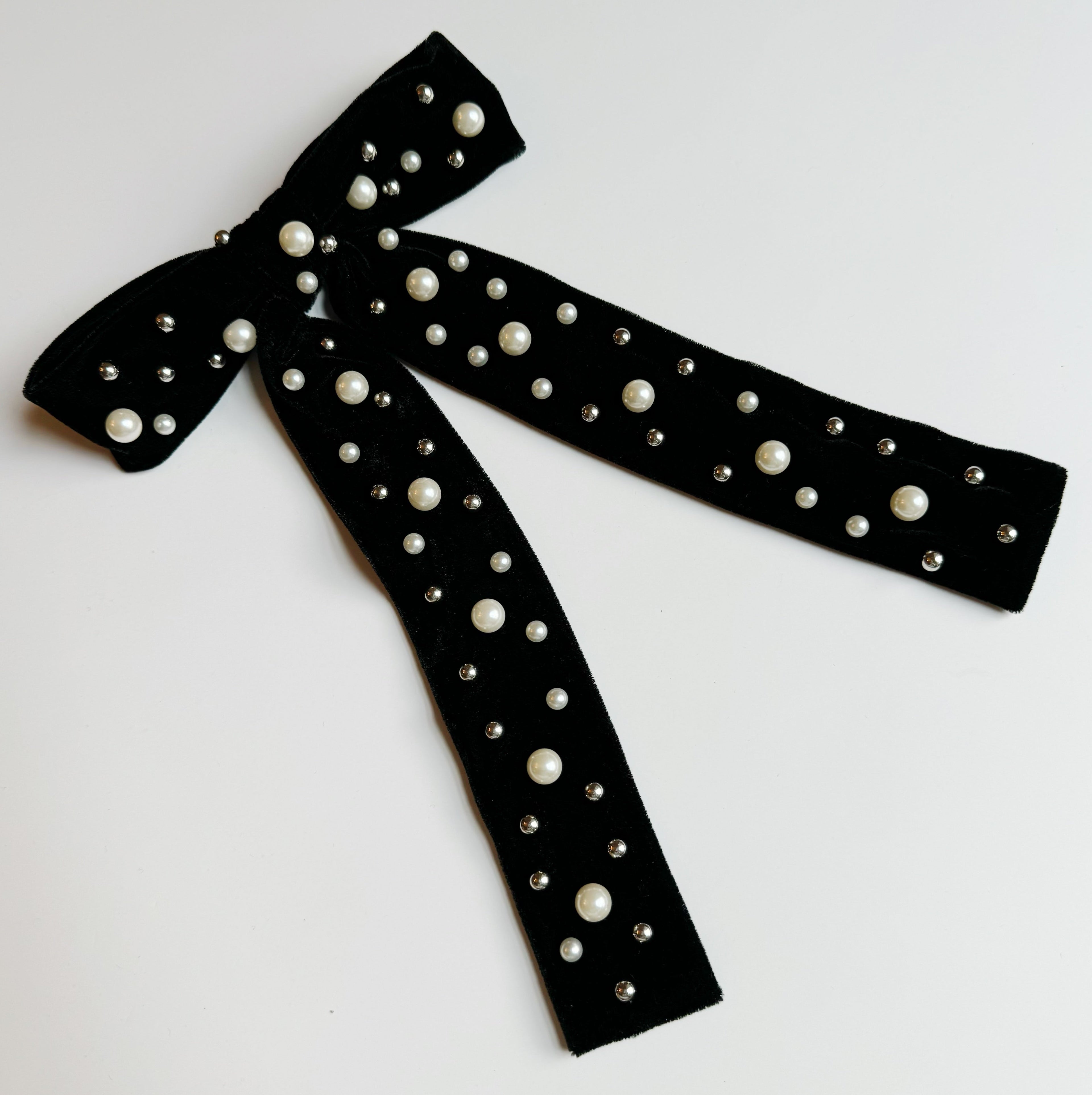 Pearl velvet bow hair clip with an elegant oversized design and secure clasp for styling. — view 2
