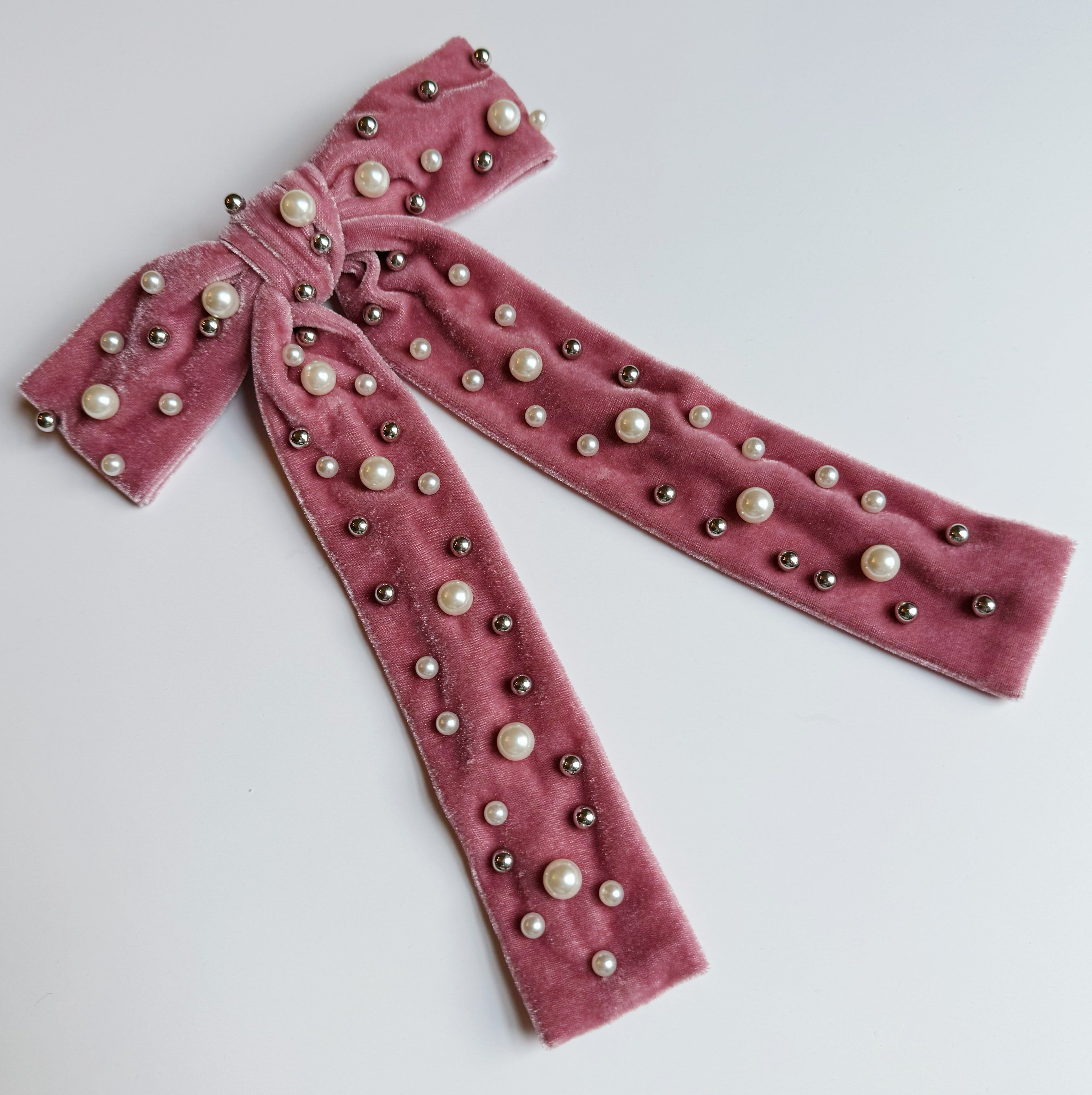 Pearl velvet bow hair clip with an elegant oversized design and secure clasp for styling. — view 3