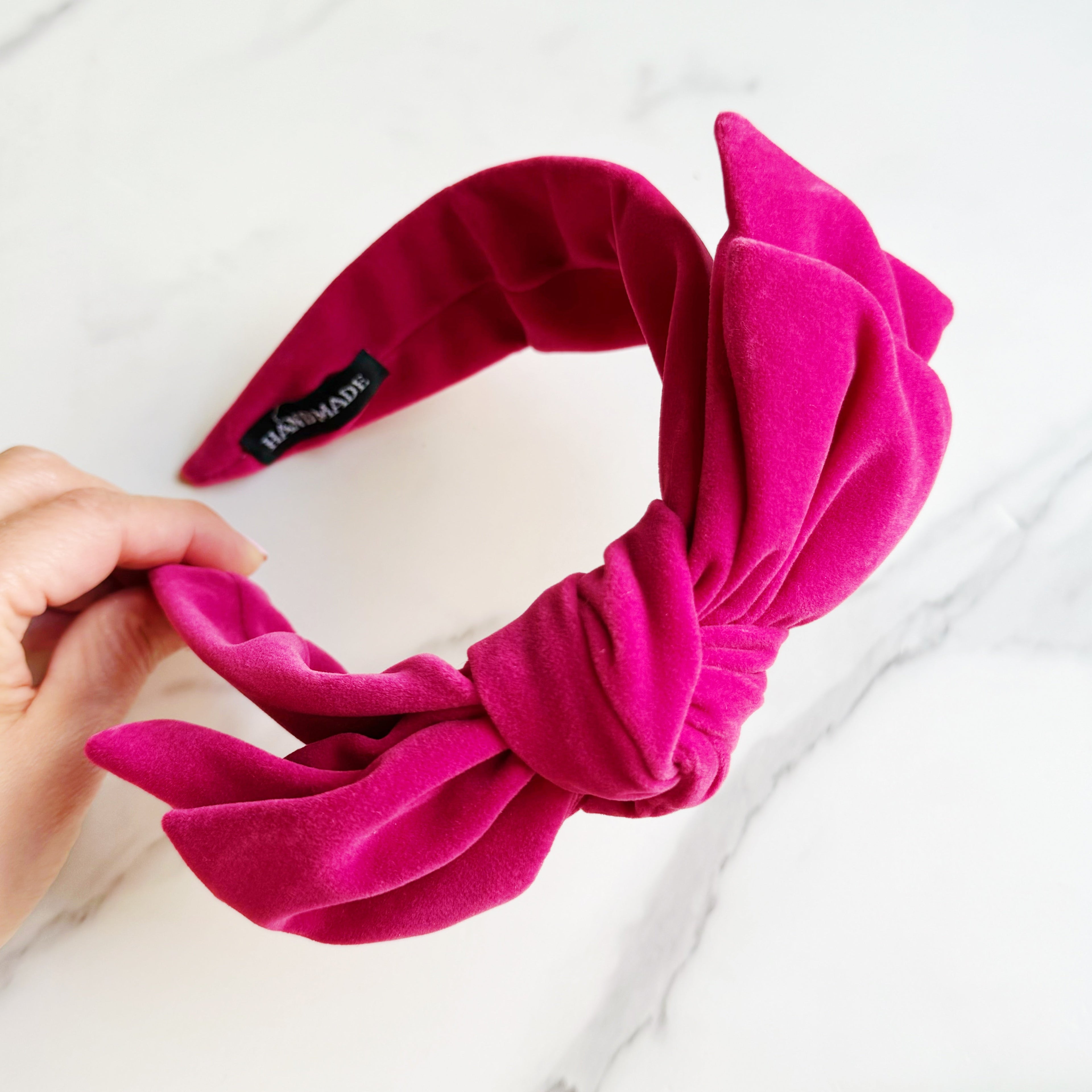 Structured velvet bow headband in a classic elegant style for sophisticated hair styling — view 4