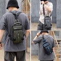 Men's waterproof nylon crossbody sling bag in black with adjustable shoulder strap and multiple storage pockets