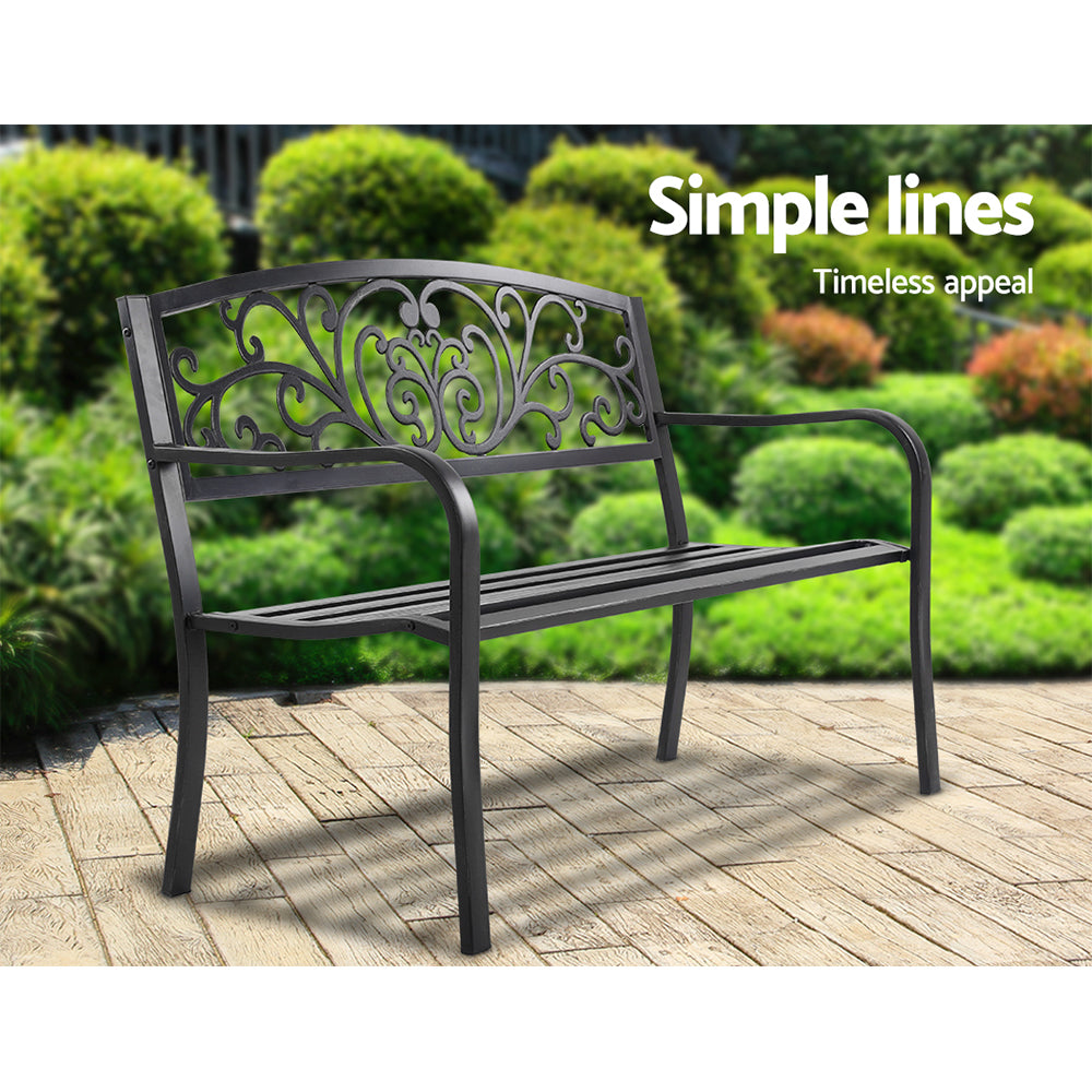 Black vintage three-seater outdoor garden bench with cast iron backrest and powder-coated steel frame. — view 4