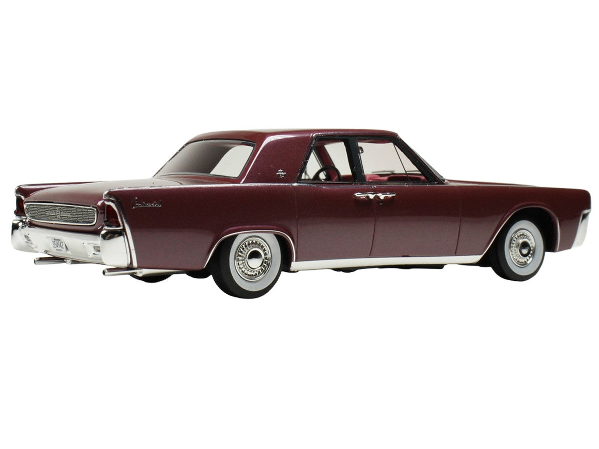 1962 Lincoln Continental 1/43 scale resin model car in royal red metallic with display case