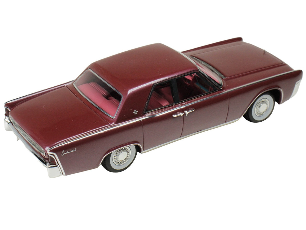 1962 Lincoln Continental 1/43 scale resin model car in royal red metallic with display case — view 2