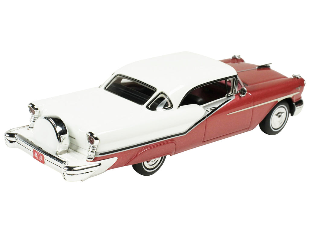 1957 Oldsmobile Starfire 1/43 scale resin model car in royal glow red and white — view 2