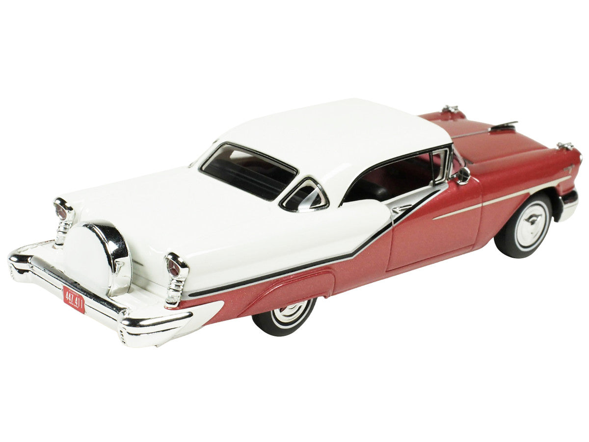 1957 Oldsmobile Starfire 1/43 scale resin model car in royal glow red and white — view 2