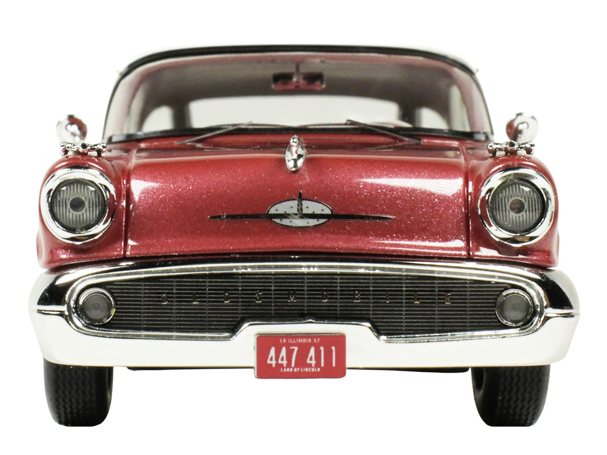 1957 Oldsmobile Starfire 1/43 scale resin model car in royal glow red and white — view 3
