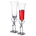 Stemmed skeleton champagne flute set of two in clear glass with intricate bone details