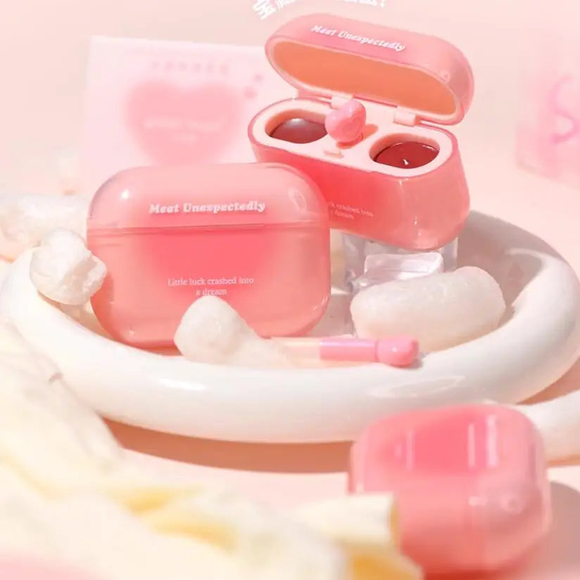 Two tubes of vegan double lip gloss with a high shine mirror finish and precision applicator — view 3