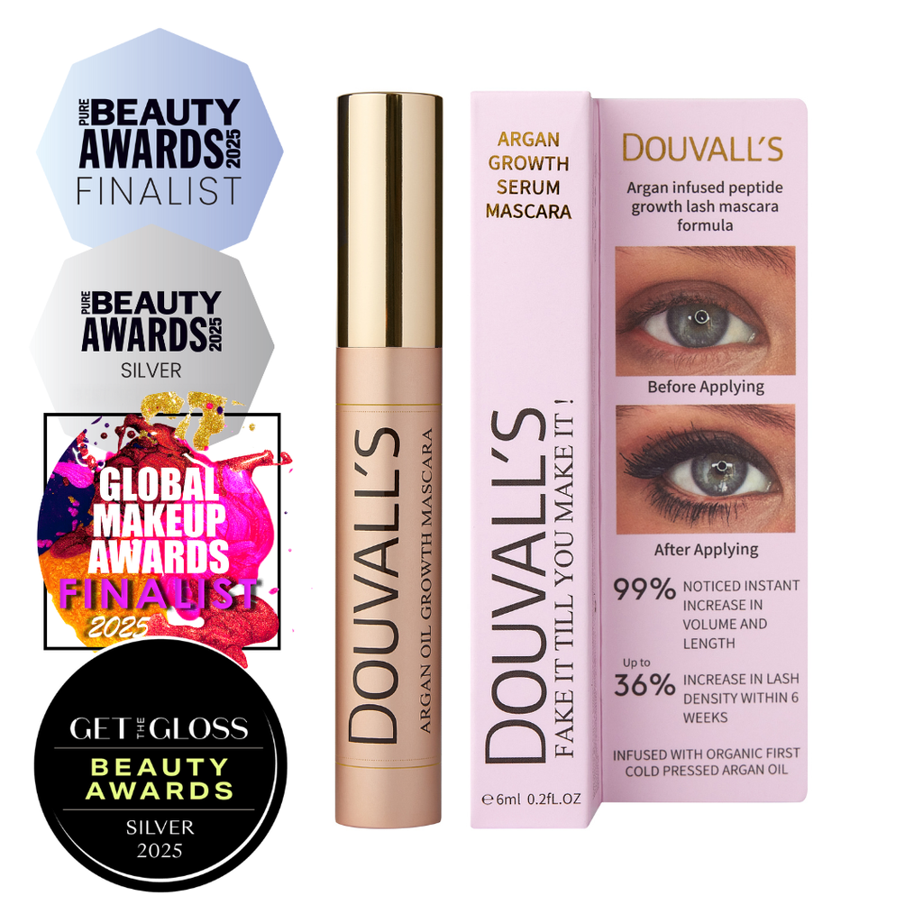 Black Argan Growth Serum Mascara tube with curved applicator brush for volumizing and lifting eyelashes.