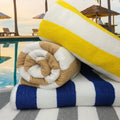 Two pack of cabana striped cotton beach towels in vibrant vat dyed colors