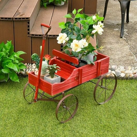 Blue wooden wagon plant bed with metal wheels and handle for outdoor garden patio displays — view 3