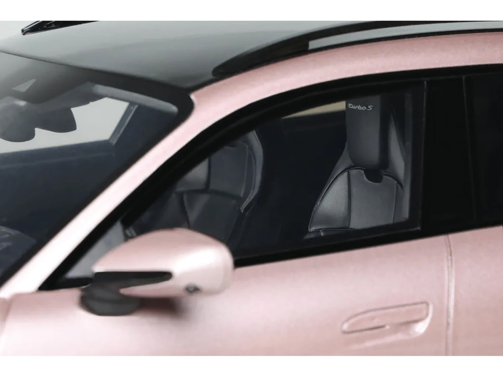 1/18 scale Porsche Taycan Turbo S model car in pink metallic with real rubber tires — view 3