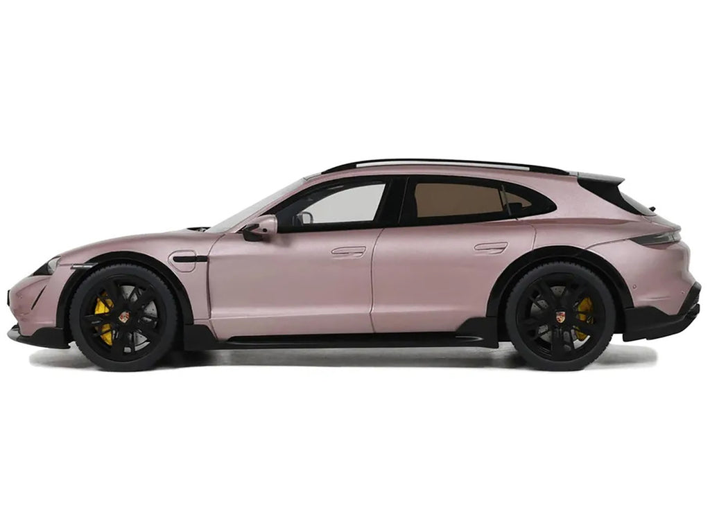 1/18 scale Porsche Taycan Turbo S model car in pink metallic with real rubber tires