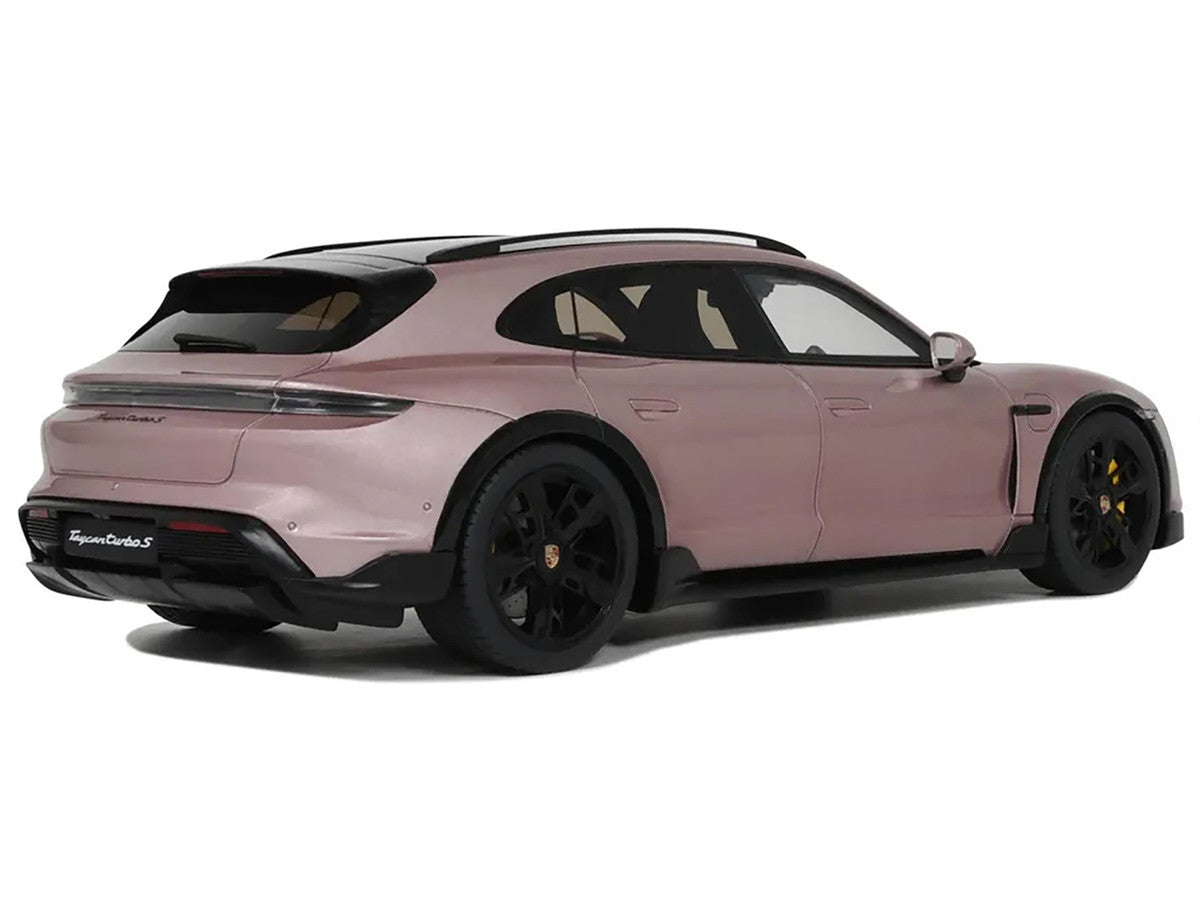 1/18 scale Porsche Taycan Turbo S model car in pink metallic with real rubber tires — view 2