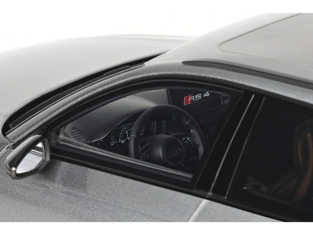 Audi RS 4 1/18 scale model car in gray metallic finish with real rubber tires — view 4